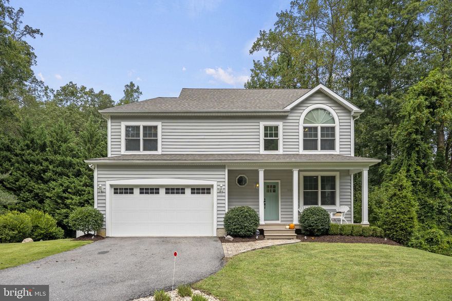 Better than new stunning colonial with beautiful seasonal Severn River water views! The sellers have done ALL of the little things to turn this newer construction home into an amazing design inspired showcase!!  You will immediately understand what we are talking about when you walk through the front door.  9 ft.+ ceilings on ALL 3 levels and walls of windows fill this home with light, love and spacious surrounds.  The main floor features a gourmet kitchen with updated quartz countertops, walk in pantry and an oversized island for everyday life and entertaining ease.  The space is open, but perfectly designed for easy flow between the kitchen, dining area, family room and the wraparound deck. The upstairs features vaulted ceilings in ALL of the bedrooms AND bathrooms.  The primary bedroom has stunning seasonal views and a spacious walk in closet along with an en suite bath featuring a jacuzzi tub, separate shower and dual vanities. You will simply be wowed when you make your way to the full walkout basement!!  Space galore with 3 different areas to utilize how you would like along with a 5th bedroom and new full 3rd bathroom all completed in 2020. All of this on an oversized, cleared, flat lot with an awesome side yard with plenty of room for all of your 2 and 4 legged friends!!  Priced aggressively for a quick sale - don't hesitate on this one!!