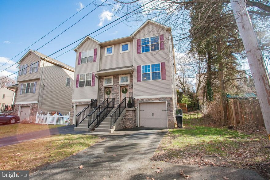 Searching for an affordable home in a great location? Look no further than 721 Seffert St in the desirable neighborhood of Andorra, near upper Roxborough, next to the Wissahickon Valley Park. Enjoy 3 car parking in the driveway leading up to the attached one car garage. The front facade is wrapped with low maintenance vinyl siding and tastefully accented with stone. An easy to care for side yard is great for pets and gardening. To the rear is a private deck accessed from both the interior and exterior. Entering through the front door leads you to either the fully finished basement with laundry, half bath and garage access, or to the main living level. The main living space has a light-filled open concept feel, desirable in today's lifestyle. The expansive eat-in kitchen has a full suite of stainless steel appliances, breakfast bar, and ample cabinet space. The kitchen overlooks the family room suitable for various furniture arrangements and leads out to the rear deck. There is a half bath on this floor as well, plus a large closet/pantry. To the front of the house you will find a multi-purpose area, which can be used for formal dining, at-home work space, a playroom, or anything your heart desires. Head up the vaulted staircase and find the master bedroom with en suite full bath and walk-in closet. The additional 2 bedrooms on this level share a large full bath with tub/shower and each have great closet space. The current owners have leased maintenance-free solar panels saving $1000s each year in electricity costs. This home has been priced to sell! Don't miss out as the spring market has already arrived!