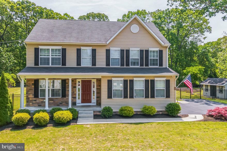 Welcome to 8413 Maryland Road in Pasadena, MD.  Situated on a flat, cleared one acre lot, this home is the ideal place for outdoor entertaining! The covered outdoor kitchen is complete with sink, two refrigerators, gas cook top, ample storage, ceiling fan, and wired for speakers.  Relax in the pavilion with beautiful stone, wood burning fireplace with mount for TV above.  Three ceiling fans, lighting and wired for speakers.    Cool off in the inground saltwater pool, with sun ledge.  Inside you will find 4 bedrooms and 2.5 bathrooms. Hardwood floors throughout the main level, spacious kitchen with center island open to breakfast room.  Wall of windows overlooking the fabulous rear yard.
House is wired for 16 IP security cameras (cameras not included)
Each room wired for Ethernet 
Pavilion and shed have wiring for wireless access points
Wiring for 12 outdoor speakers that terminate into basement (2 at deck slider, 2 in outdoor kitchen, 4 around pool and four in pavilion
All exterior lights controlled by Wi-Fi enabled switches (work through app globally)
Pool is salt water with a diatomaceous earth filter 
Pool comes will solar cover and reel and winter safety cover
Outdoor kitchen comes with everything but the 2 Big Green Eggs
Pavilion ceiling fans controlled by remote or app controlled globally 
Hot and cold water rough in ran to behind the pavilion for future outdoor shower or other water needs
Furnace programmable thermostat controlled through app globally.  Network equipment including wireless access points do not convey, but the patch panels and network rack in basement will stay