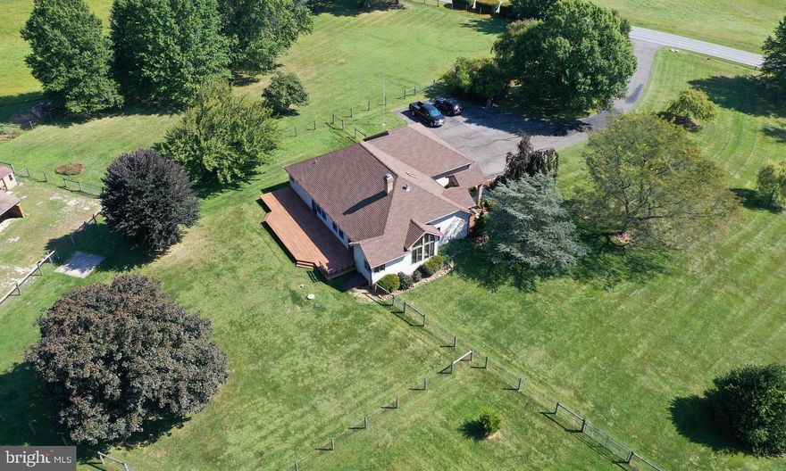 MOTIVATED SELLERS! While boarding their horses nearby, these sellers began their own search for a horse property. The criteria seemed simple enough—a one-story home with 5 to 7 acres within a 5-to- 7 mile radius of Fair Hill Natural Resources ManagementArea. It took almost two years to accomplish their goal, and both enthusiastically agree it was worth the time and effort!

Their dream became reality while touring this Blue Ball Rd farmette in person. It consisted of a lovely one-floor living home situated on a horse—& people—friendly flat, cleared, 4.85 acre parcel. Not only did they foresee great potential in designing and positioning the barn, fencing, backyard, water, electric, pastures, gates, and hay storage—it was complete with beautiful views from the top of a hill. There is even additional area left to expand the fencing should more pasture be needed! The
result—these folks kept four horses on the property very comfortably!

The Amish built shed-row barn faces south and has an 8’ overhang providing necessary
shade without the need for additional run-in sheds in the pastures--unlike a center aisle
barn, requiring turn outs. Each stall and end walls have windows for ventilation. There is
a water hydrant for easy bathing, filling water buckets, and cleaning up.

Each 12’ x 12’ stall is matted and has access to electric. Stalls are well-lit with caged lights inside and out. Light fixtures on the back of the house illuminate your way to safely travel between the barn and house. A Bar-Bar-A frost-free automatic waterer is right in the dry paddock area, too. You may even enjoy waking up and seeing your horses before you get out of bed in the morning just as these sellers did!

It goes without saying that the 5600+ acre Fair Hill NRMA is the premiere horseback riding venue for people who love riding and being in nature with their horses. Riding its 80+ miles of clearly marked and well-groomed trails and meadows is a trail rider’sparadise. Just go and enjoy its amazing views, sounds, and smells! Babbling brooks and the Big Elk Creek provide ample water for horses. There is a campground, multiple parking locations, and bathroom facilities in the park.These sellers actually trained two very young horses at Fair Hill with the help of their older horses who showed them the ropes! They learned how to cross the creek via steel bridges, a wooden covered bridge, and in the water. Along with pedestrians and bicyclists, they learned how to pass horses respectfully on trails, too.

Please come and visit soon!