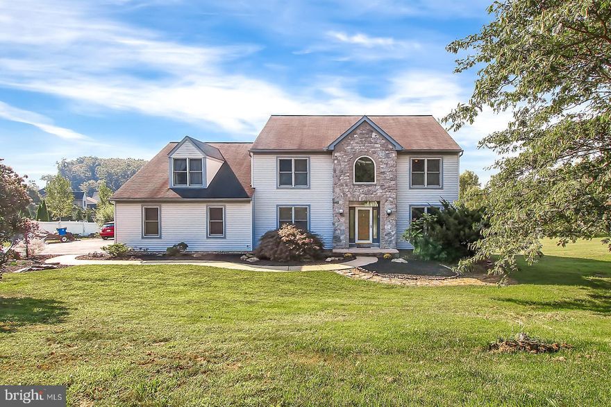 If you are looking for space look no further,  Large 4 bedroom home in Dallastown Schools resting on a rolling 1.4 acre lot boasts 4312  square feet of finished living space, with a full unfinished walk out basement for your future additions,  enjoy the many amenities this home offers, including an open floor plan with a large eat in Conac kitchen with large center island, double built in wall ovens, gas cooktop range,  large pantry and full breakfast area, snack bar & convenient mud/laundry room off kitchen,  large home office off foyer,formal dining room, inviting sunroom off family room with access to a two dier maintenance free deck.  Owner's suite offers plenty of space for your King Size bed & sitting area with access to your private balcony overlooking the tranquil setting and water fall feature, no closet sharing here, with his and her walk in closets each  of you will have plenty of closet space, master bath with soaking tub,double vanity & useful laundry chute,ample size additional bedrooms, 3 car garage outfitted with plenty of overhead storage  for all your toys & lawn needs.