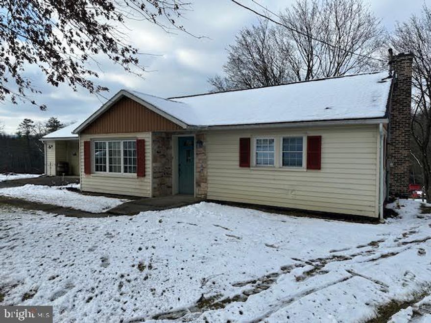 Move right in to this rancher with new carpet, interior repainted, plenty of oak cabinets wit corian counters and granite top on island, the full bath has been updated by Bath Fitters.  The dining room opens into the kitchen for cooking and serving convenience.  Replacement windows have already been done.  Basement is unfinished and offers plenty of storage or finish for your choosing.   The large rear and side yard offer many options and recreational uses.  Call for your tour today!    Right of way on right side of property only a small portion where homes are located to the rear & sewer easement to the very back of the property.  PROPERTY BEING SOLD AS-IS!