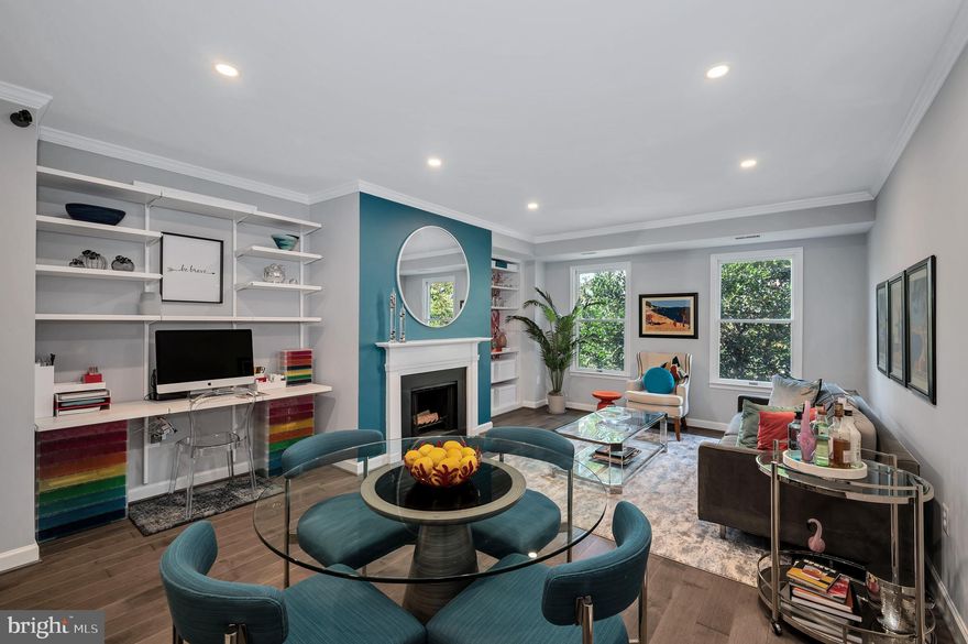 Exceptional and seldom available one bedroom one bath condo in St. Asaph Square near the heart of Old Town and it’s waterfront. This beautifully updated condo has it all from open floor plan to stunning grey maple hardwood floors and recessed pod lighting throughout the property.  The hall closet has a customized Elfa pantry and storage solution system that allows you to maximize this space.  Stainless steel appliances, quartz countertop and subway tile backsplash in the kitchen with a pass-through window to the dining area. Bright and airy living space with wood burning fireplace, custom built-in bookcases and built-in desk with shelving allowing for the perfect multi use of space. The utility closet has a full-size front-loading washer and dryer and additional Elfa utility shelving.  A bright and well-lit bathroom with shower tub combination, updated vanity and mirror. Spacious bedroom with linen and custom walk-in closet with Elfa Storage Solutions System, black out shades, and additional pod lighting.  The Landlord has also installed an upgraded 50 gallon water heater, programable Nest thermostat and a hardwired Protect smoke/co2 detector in the unit.  This property has and incredible utility of space with an elegant touch.  The community has an outdoor pool area, bike storage and newly renovated common areas with two lobbies. There is a professional on-site property manager for the building. This is a secure building with monitored exterior and garage security cameras.  Private parking spot is #81 and storage unit is #408 both located in a secure garage. This property is conveniently located near local shops, restaurants, gourmet grocery store.  Only minutes away from the heart of Old Town, DC, Reagan National Airport, Pentagon, National Harbor, Huntington Metro, Fort Belvoir, Bolling AFB, and the 495/95 interchange. This property has endless possibilities and will allow you to have the lifestyle you enjoy. Included in rent:  parking, storage, water/sewer, trash and landlord is covering condo fee. Flamingo wallpaper behind built-in bookcase is peel & stick vinyl and can be removed per the tenant's request.