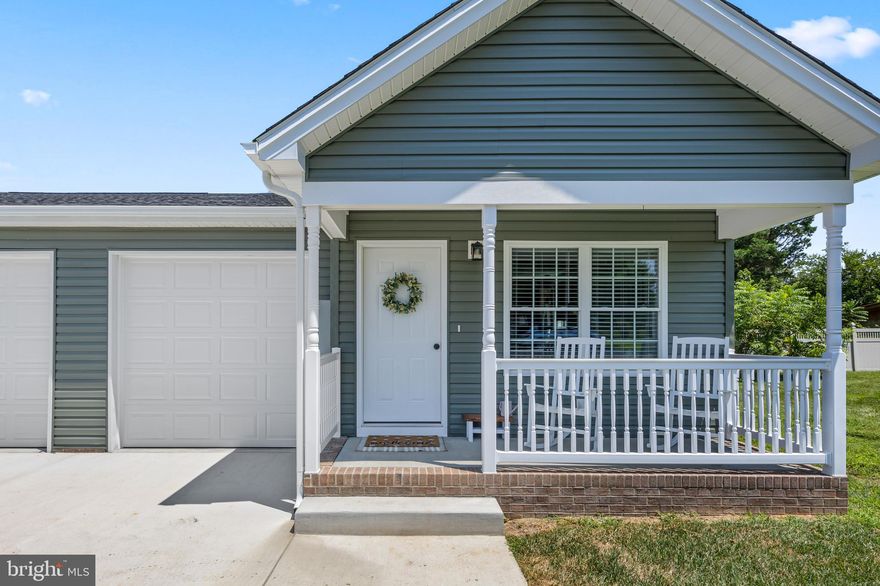 Welcome to this spacious three-bedroom, two-bath duplex offering over 1,100 square feet of modern, one-level living. Built in 2023, this home features a smart and functional layout designed for comfort and convenience. Enjoy an open-concept kitchen and living area complete with stainless steel appliances, quartz countertops, and plenty of room to cook, dine, and relax. Each of the three generously sized bedrooms includes an enormous closet, offering excellent storage options. The home showcases luxury vinyl plank flooring throughout and a full-size washer and dryer. A spacious attached garage provides even more storage or parking flexibility. Outside you will find a covered front porch, a cozy back deck, paved driveway / parking area, and even a rear yard that offers potential to be fenced for pets or added privacy. No HOA and town water/sewer/trash collection add to the convenience. Located close to Luray Elementary and Middle Schools as well as downtown Luray, this nearly new home is one you will not want to miss. Schedule your showing today!