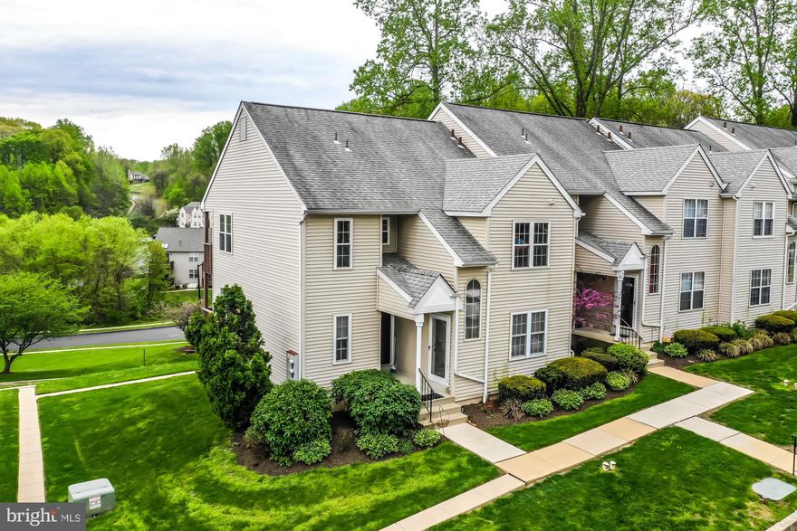 Welcome home to a lovely 2 BDR, 2 Bath 2nd floor, end unit condo in the in the highly sought after  community of Ballinahinch. Enter into the open living and dining area, illuminated by skylight and sliding glass door. After a hard day s work, come in and relax on you private balcony enjoying the outdoors and evening breezes. The living and dining area feature laminate floors and fireplace. The kitchen is adjacent to the dining and living area featuring ample cabinet space, newer electric stove/oven, dishwasher and stainless steel refrigerator. Down the hall you will find 2 bedrooms. The MBR is large with hardwood floors  a Walk-In closet and MBR Bath. The large second bedroom can be used as a BDR, office or multi-purpose room. Additional full size bath is adjacent to the second BDR. Ample closet space through out the unit, including a newer stackable washer/dryer. Additional storage, with separate access is found in the basement. Ample parking, community playground, community tennis courts. Close to major highways, Rts. 452, 1 and 352 for all your shopping needs.