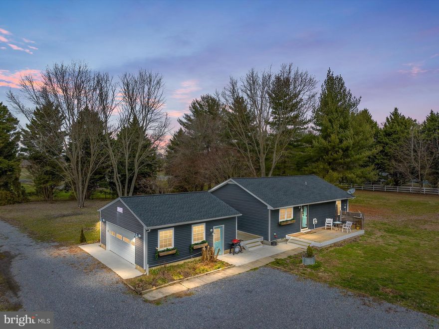 Recently updated and remodeled one level living on almost 2 acres.  3 bedrooms, 2 full baths this home is ready for its new owners. The entire home has been recently  updated to include new windows, flooring, doors, new heat pump, new siding, and roof. Beautiful custom shiplap has also been installed. Best of all is the open concept gourmet kitchen with a walk in pantry and custom wood work. The large yard offers the privacy one may be looking for. There is plenty of room for summer BBQ's and get togethers. The outside features include two large decks, a large detached garage and plenty of parking. All this and only 20 minutes to the Bay Bridge. Schedule a tour today!