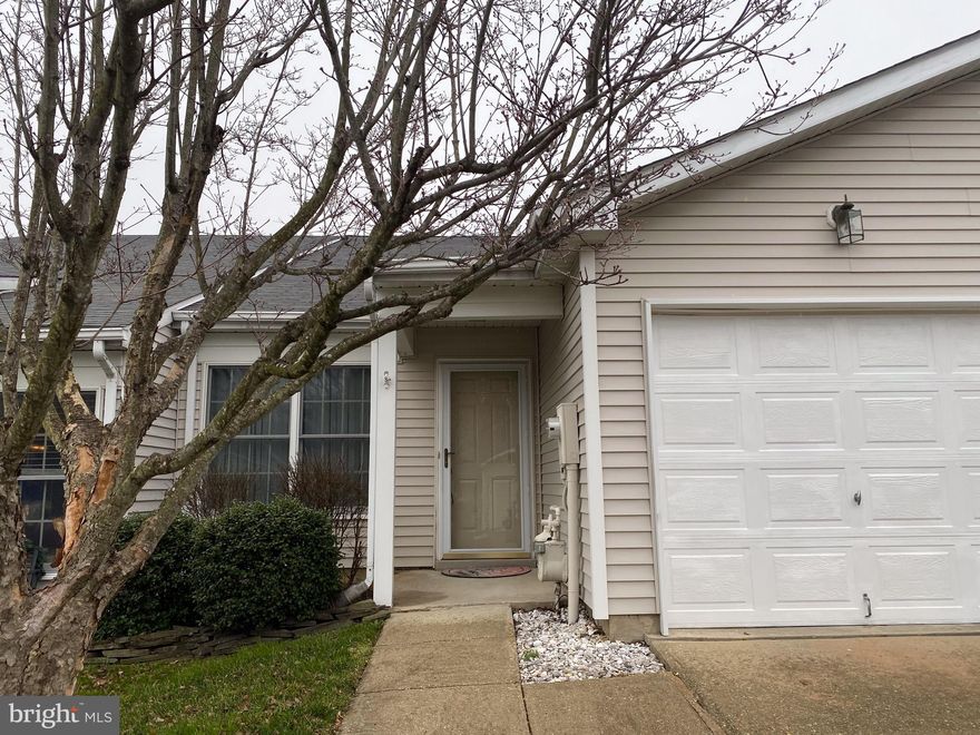 55+ active community.  Over 1900 sq ft of space in this rarely available 2 level with 2 bedrooms and 2 dens-one on each floor,  Eat-in kitchen with granite countertops.  2 large bedrooms, 2.5 baths, with master on the main floor.  Family room with gas fireplace and access to back deck. Upper level has full bath, a large  bedroom, another den and  craft  room with built-ins.  New flooring, new carpet, freshly painted. Professionally cleaned!!! Cannot beat the location!  Walk to shops.  Close to Clubhouse & all the wonderful amenities the 55+ community has to offer.  One time fee of 2055.00 to all new residents of Heritage Harbour paid at settlement.