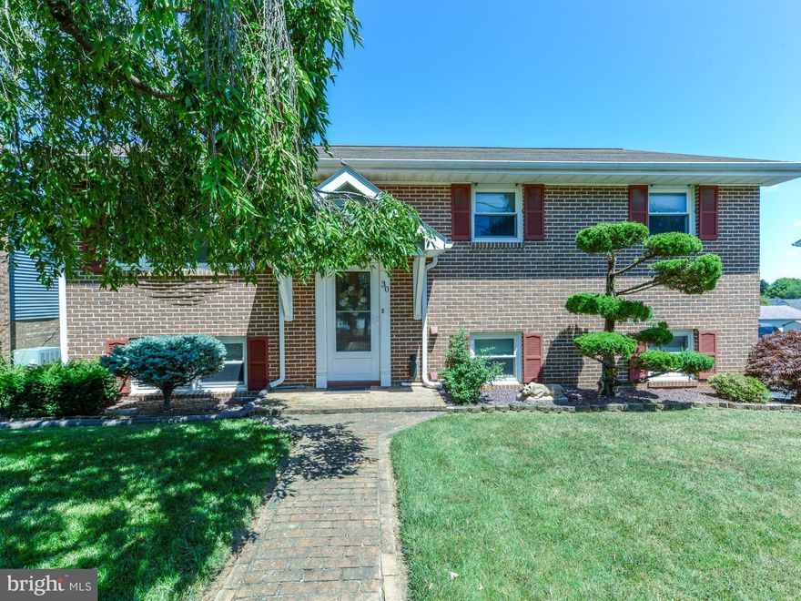 Located in Penn Township in South Western School District  York County, This charming 4-bedroom and 1 1/2-bathroom home is sure to please! It offers The convenience of being close to town while also being  in a quiet neighborhood, The  main level  has an  open living room with a gas fireplace , Large Dining room is open to country  kitchen. Walk down the hall to 3 spacious bedrooms and a full bath. You'll enjoy this home's lower level with a large Family Room that opens up to a 4 season room where you can look out over the  private back yard or sit out on the 2 level deck in the evening before retiring to the large master bedroom with walk in closet. A 1 car detached  garage is out back. Schedule your showing today! This one won't last long!!!