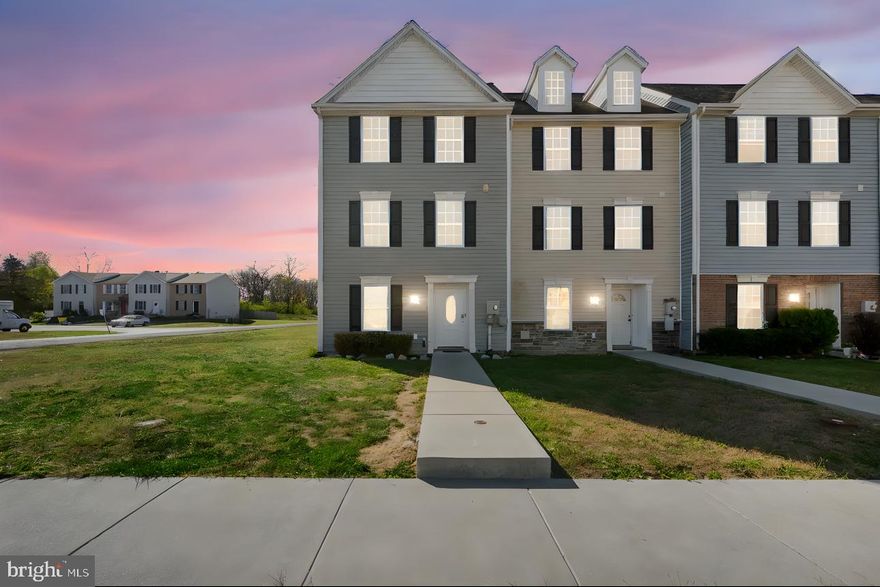 Welcome to this spacious 4-bedroom, 3.5-bath end-unit townhome.

The gourmet kitchen features upgraded cabinets, granite countertops, a designer backsplash, and stainless steel appliances. The large living room offers a versatile layout that can easily accommodate various furniture arrangements. The dining area opens to a newer deck, perfect for outdoor dining or grilling.

Luxury vinyl flooring runs throughout the main and lower levels, providing both style and easy maintenance. Upstairs, the primary suite includes a walk-in closet and an en suite bathroom with a double vanity, accompanied by two additional bedrooms and a full hallway bath.

The fully finished lower level offers a spacious fourth bedroom or recreation room, a full bathroom, and walkout access to the backyard. A laundry area is also conveniently located on this level.

This home combines modern finishes, functional space, and a convenient layout — ideal for comfortable everyday living.