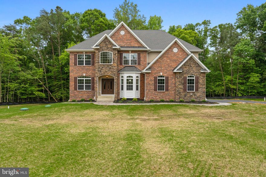 Welcome to your dream home! This newly built and stunning 5 bedroom, 4.5-bathroom residence boasts a beautiful brick and stone facade and meticulously landscaped surroundings. From the moment you step into the grand foyer, adorned with a one-of-a-kind chandelier, or take a moment in your private study you'll be captivated by the attention to detail and precision in every corner of this home.
The heart of the house features an open floor plan that includes a breathtaking 2-story family room with towering windows that bathe the space in natural light, complemented by a cozy fireplace perfect for relaxing evenings. The chef-inspired kitchen is a culinary masterpiece, equipped with stainless steel appliances, custom cabinetry, and a spacious kitchen island/breakfast bar. A guest suite with full bathroom is perfect for guests or live in family members. Upstairs, the king-sized master suite offers a luxurious retreat with two walk-in closets! The master bathroom is designed for ultimate relaxation, featuring a soaking tub, a walk-in shower, dual vanities, and a private water closet. Three additional bedrooms provide ample space for family, guests, or hobbies. The amenities don’t stop there! Enjoy a home movie theatre, laundry room, expansive garage, luxury vinyl plank flooring and high-end fixtures which add a touch of elegance throughout the home. Don't miss the opportunity to own this exquisite property that perfectly blends luxury, comfort, and elegance.