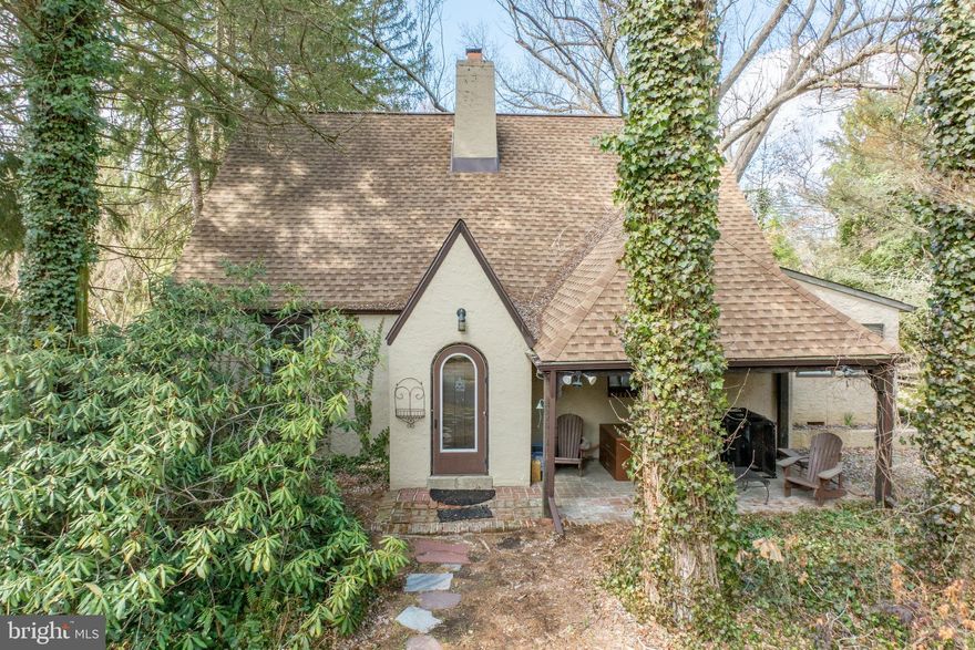 This charming Tudor-style home awaits a new owner to bring it back to its timeless character.   Featuring original hardwood floors and leaded light windows throughout, the home offers a warm and inviting space. While the cozy kitchen reflects the home's classic roots, the unbeatable location—just minutes from the vibrant shops and restaurants of downtown Media—makes this residence a rare gem in today's market. Situated on a flat, wooded lot, on a private lane, the property provides ample outdoor potential for gardening, play, or relaxation. Property is being sold AS IS, with Buyer responsible for all U&O certifications.