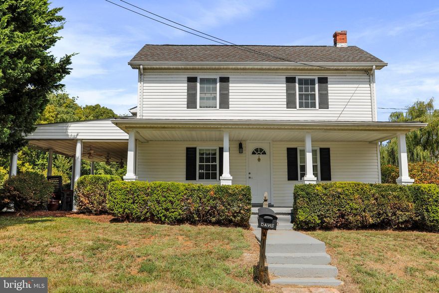 Nestled within a tranquil country setting on 1.5 acres of sprawling land, this remarkable 1900 farmhouse exudes timeless charm while seamlessly incorporating modern comforts. A stunning marriage of old-world allure and contemporary conveniences, the farmhouse boasts an inviting fusion of a classic exterior and a newer addition that expands the living space without compromising its historic character. Greeting you with open arms, the home showcases gorgeous covered front and back porches, perfect for savoring sunsets and sipping morning coffee while basking in the serene embrace of nature. Majestic mountain views provide an awe-inspiring backdrop, elevating the allure of this property. A detached garage offers both parking and storage solutions, ensuring functionality alongside beauty. Inside, updates and upgrades abound, from the elegantly renovated kitchen, huge great room, master suite with extra large walk in closet & more. This farmhouse is more than just a home; it's a testament to the seamless blending of past and present, where comfort, style, and natural beauty harmoniously coexist.