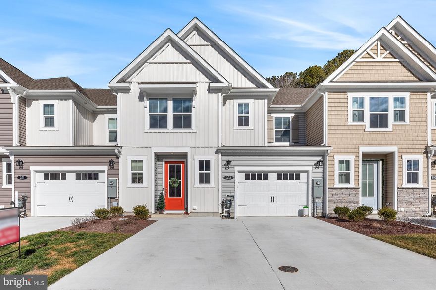 Located in Ocean View, this stunning townhome places you at the center of Delaware’s most desirable coastal amenities close enough to enjoy it all, yet tucked away for everyday tranquility. This newly constructed two-story townhome features $37,575 in builder upgrades and is ideally positioned on a quiet cul-de-sac with peaceful wooded views that deliver both privacy and serenity. This home offers the perfect blend of coastal lifestyle and everyday convenience just minutes from Bethany Beach, renowned dining, shopping, golf courses, and scenic outdoor attractions. Designed for modern living, the upgraded kitchen showcases stainless steel appliances and a functional layout ideal for both entertaining and daily use. Thoughtful enhancements include upgraded electrical outlets for seamless flat-screen TV installation and an electric vehicle outlet in the garage, offering future-forward convenience. Generous walk-in closets and ample under-the-stair storage ensure the home lives as beautifully as it looks. The primary suite, conveniently located on the main level, features an upgraded tray ceiling and a spa-inspired en-suite bath with elegant tile finishes creating a true retreat at the end of the day. Upstairs, a versatile loft provides flexible living space, accompanied by two additional bedrooms and a beautifully tiled full bath, perfect for guests, family, or a home office setup. Whether you’re seeking a primary residence, second home, or coastal investment, this move-in-ready property delivers comfort, style, and location without the wait. Why wait for new construction when you can step right into coastal living today?