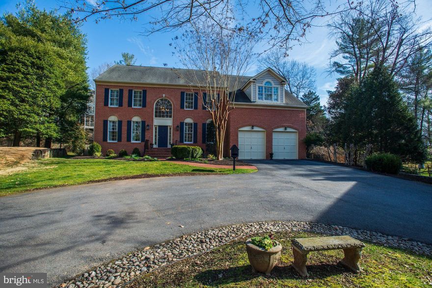 (Use GPS to locate, home is not on busy MacArthur Blvd) Oh my gosh---Here it is!!  A really wonderful offering with...  the coveted, hard to find 9' ceilings, a great circular floor plan, a big open kitchen/family room with a floor-to-ceiling stone fireplace (gas), the kitchen with a breakfast bar and loads of storage, a main level library with built-ins,   a private main level Bedroom (In-Law Suite or second home office) with an en suite full bathroom; a spacious Master Suite  with a vaulted ceiling and reading nook plus a separate sitting rm;three additional bedrooms fully finished lower level with exercise/hobby room, recreation room with custom built-ins and wet bar,  an Au Pair suite with adjacent full bathroom and a kids playroom or additional storage room.    This should check everything on your list!!  Enjoy the private, quiet cul-de-sac setting  with easy access to the C&O Canal, Billy Goat Trail and Old Angler's Inn.  Popular, active swim/tennis community with clubhouse, tot lot, soccer field, 6 tennis courts, baseball diamond and Olympic size swimming pool and baby pool.    Dream location just off the Clara Barton Parkway and I-495 offering easy access downtown, south to Tyson's Corner/Virginia or North to the I-270/BioMed Corridor.  Whitman School cluster.   You won't be disappointed; make an appointment to see it today!