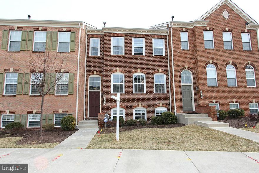 Gated Community- Large, well-maintained brick front TH nestled in the sought after golf course community of Waverly Woods. Golf Course Views, 12 FT Bump out, 9 FT Ceilings, Open Floor Plan with upgrades. Gourmet kitchen with SS appliances, cherry cabinets, granite counters with island open to family rm & sun-lit breakfast rm & walkout to deck.  Spacious MBR Suite, Finished walkout LL with patio.