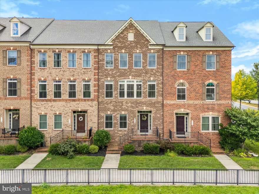 Welcome home to 9114 Kenway Lane... a beautifully maintained and freshly updated brick-front townhome, located in the highly sought-after Villages of Urbana—one of Frederick County’s most vibrant and desirable communities. With 3 spacious bedrooms, 3 full baths, 1 half bath, and over 2,000 square feet of comfortable living space, this home offers the perfect blend of modern style, functional design, and unbeatable location.

Step inside and immediately notice the fresh, top-to-bottom paint that gives the entire home a crisp, clean feel. The inviting open floorplan is perfect for both everyday living and entertaining, featuring an abundance of natural light, high ceilings, and a seamless flow from room to room.

The heart of this home is its gourmet kitchen, complete with stainless steel appliances, granite countertops, a large center island with bar seating, and ample cabinetry for all your storage needs. Whether you’re preparing a casual breakfast or hosting a dinner party, this kitchen delivers both style and functionality.

Just off the kitchen, step outside to your private rear deck—a peaceful spot to relax with your morning coffee, grill dinner, or enjoy the fresh air. 

The main level also includes a generously sized living and dining area with rich hardwood floors and large windows, along with a convenient half bath for guests. See the mirror in the dining area... open it up and take a peek for a unique surprise that the youngest homebuyers are sure to enjoy! 

Upstairs, the spacious owner’s suite features a tray ceiling, walk-in closet, and a luxurious en-suite bath with dual vanities and a separate glass-enclosed shower with dual shower heads. Two additional bedrooms share a well-appointed full bath and offer plenty of space for family, guests, or a home office.

Downstairs, the finished lower level includes a large office with beautiful French doors, a full bathroom, and access to the attached 2-car garage. Whether you need a media room, workout space, or additional guest quarters, this flexible area can be customized to suit your lifestyle. The attached two-car garage and private driveway provide parking for up to four vehicles—an uncommon luxury in townhome living.

Beyond the home itself, the Villages of Urbana offers an unbeatable lifestyle. Enjoy easy access to shopping, dining, grocery stores, award-winning schools, and resort-style community amenities including multiple pools, clubhouses, fitness centers, playgrounds, and walking trails. Commuters will appreciate the easy access to I-270 and MD-355, making travel to Frederick, Gaithersburg, Rockville, and even DC a breeze.

This is more than just a home—it’s a lifestyle upgrade in one of the area's most premiere neighborhoods. Whether you're a first-time buyer, relocating, or simply looking to upgrade, this move-in ready home checks every box. Welcome to 9114 Kenway Lane... welcome HOME!