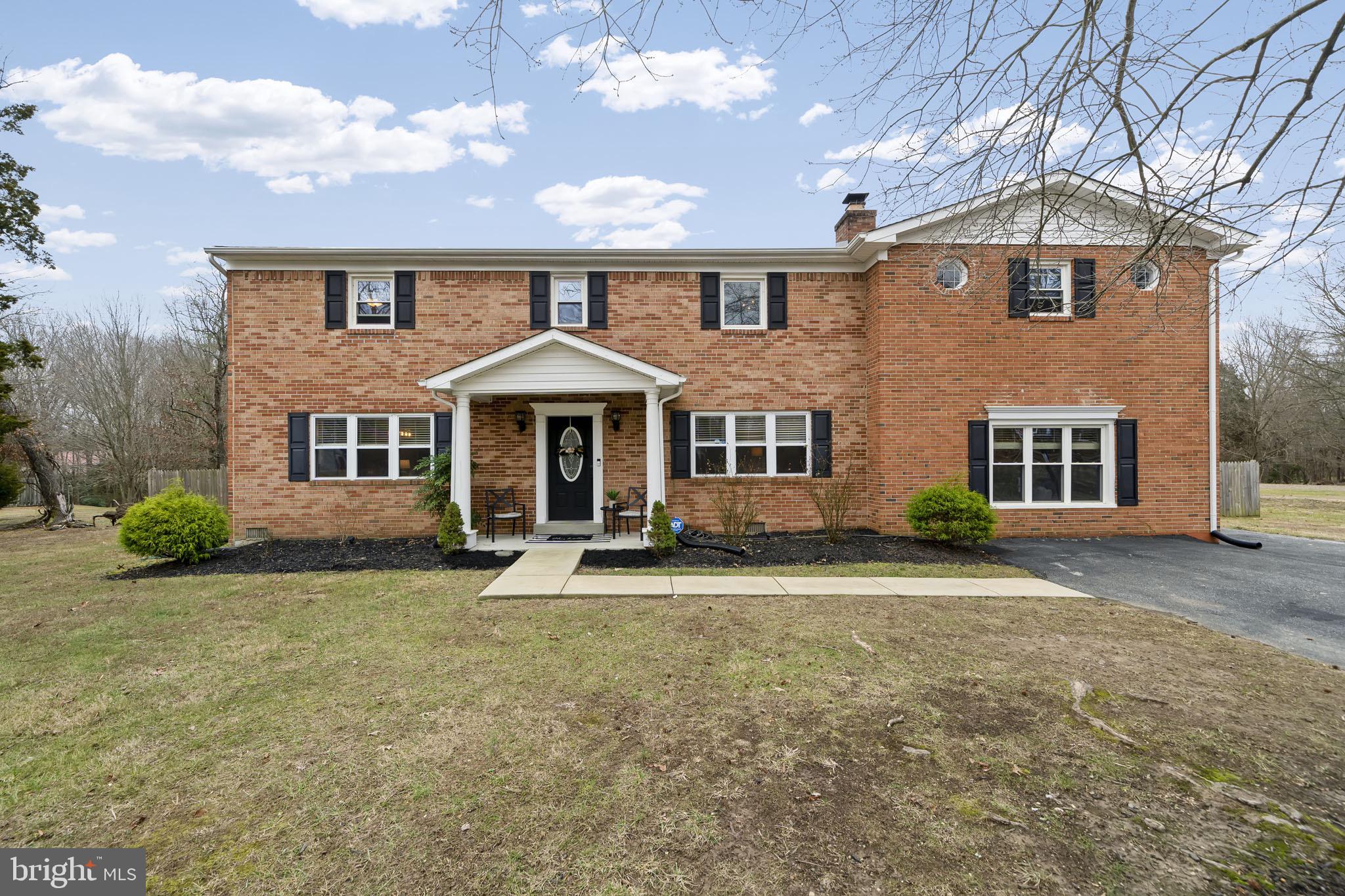 USDA eligible. 100% financing ZERO money down to qualified buyers. !! No HOA!!!Welcome Home. This immaculate modern colonial is everything you’ve been looking for! Nestled on a large 1.44 acre flat lot with endless possibilities perfect for building a detached garage or an in ground pool. Enjoy your beautiful fenced in yard from the privacy of your multiple decks! This 5 bed 3.5 bath home with over 4000 sq ft of pure living space has been updated from top to bottom. Your formal living room greets you with beautiful hardwood flooring, a custom fireplace with herringbone tile, shiplap wall with a gorgeous hand built wood mantle. Your beautiful bright and airy kitchen is updated with stainless steel appliances, tons of cabinets, designer backsplash a coffee bar and a huge pantry. Leading from the kitchen is another living area with a custom built electric fireplace making this room extra cozy for family gatherings. Your formal dining room has been updated with beautiful chair railing and modern light fixtures. Step down into your family room with a built in bar perfect for entertaining. Upstairs you’ll find 5 bedrooms and 3 full baths. Your primary suite with dual fireplaces gives you more space than you could ever desire. Enjoy morning coffee with the serene sound of birds chirping off of your private balcony. The en-suite bath has a massive walk in shower with beautiful tile! Another huge master provides even more space with 3 huge closets! All of this in a neighborhood with no HOA!! The extra long paved driveway has ample space to bring your boats and Rv’s! New roof, gutters, windows, HVAC, Hot water heater, stainless steel high efficiency appliances and brand new well were installed in 2018. This is a home you simply do not want to miss!! Schedule your showing today!