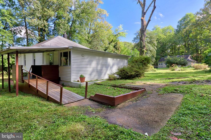 Rare two-acre property in the Severna Park School District adjoining the B&A Trail (Eastcoast Greenway) for easy access to biking, walking, jogging and other nearby recreational activities. Zoned R-1. Collect rent while planning your dream home or potential subdivision. A wonderful property for someone looking to park vehicles, boats, trailers, RVs, trucks, and more. Abundant privacy, wildlife, firepit and outside yard space with no HOA restrictions. Refinished hardwood flooring in living room, den and bedrooms. New paint throughout. Newly updated bathroom. Replacement windows. Extensive storage available in outside sheds and in the cellar/basement. Convenient access by car, foot or bike to historic Annapolis. Easy access to major commuting routes.