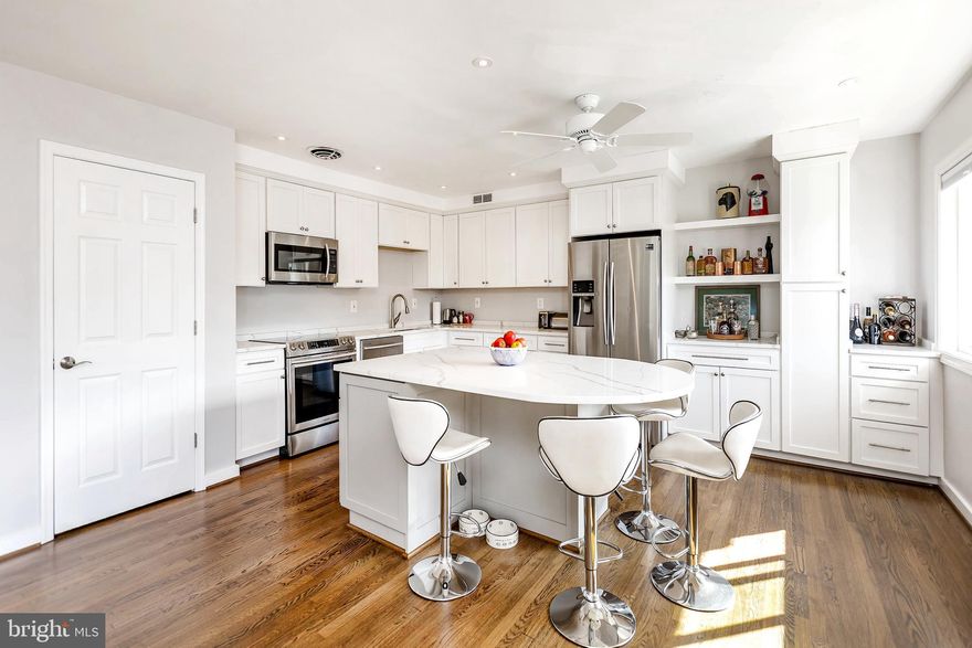 Beautifully updated 2-bedroom, 1-bath condo in the desirable Sumner Court community. All utilities included. This turn-key home features a renovated kitchen with white cabinetry, quartz countertops, a large island, and plenty of storage. The open floor plan connects the kitchen, dining, and living areas—perfect for relaxing or entertaining. Enjoy hardwood floors, custom built-ins, and a fully renovated bathroom with modern finishes. Both bedrooms offer great natural light and upgraded closets. Step out to your private balcony to enjoy your morning coffee or unwind in the evening.
Community amenities include a pool, picnic park with grills, tot lots, and plenty of unassigned parking. Condo fees cover all utilities, and a separate storage unit is included.
Fantastic location across from The Shops at Sumner Place (Safeway, Starbucks, CVS, Praline Bakery, restaurants, and more) and close to Capital Crescent Trail and C&O Canal. Easy access to Bethesda, downtown D.C., NIH, and Sibley Hospital.