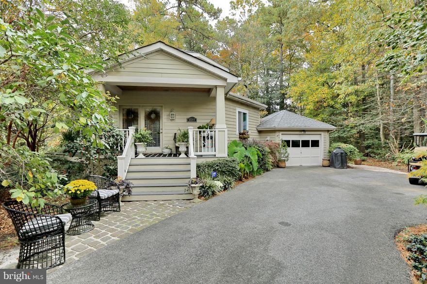 MUST SEE! Priced below appraised value. Captivating home nestled in Swan Point.  Oversized main level master suite, 3 full bathrooms one in each bedroom, unique spiral staircase to second master. New roof, new HVAC, new windows, and doors. Renovated all season room, private lot with amazing outdoor living space the ultimate location for relaxation Baywise demonstration garden with 2 rain barrels