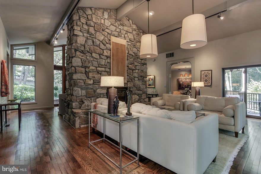 Stunning contemporary on beautiful treed lushly landscaped lot with pool * Privately located on a cul de sac * Walls of windows offer scenic vistas from every room * Dramatic two story stone fireplace flanking the foyer & great room * Top of the line designer kitchen & Zen Master bath with heated floors * Walkout lower level with au pair suite, two full baths, family room & billiards room *