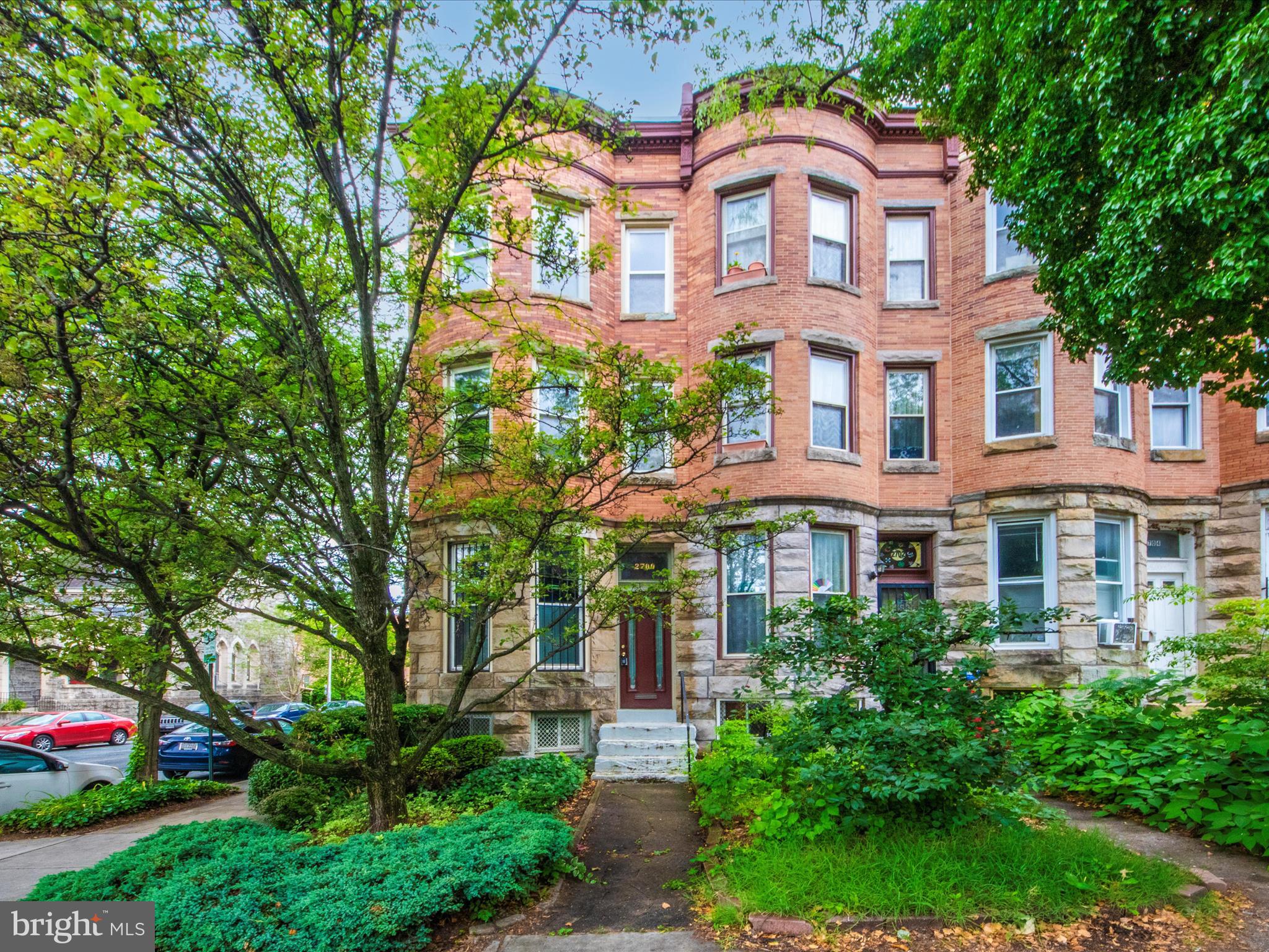 This property exudes a delightful sense of nostalgia with its whimsical vintage charm, perfect for those who appreciate unique architectural details and historical character.
Architectural Highlights:
• Pocket Door: A charming pocket door adds a touch of elegance and functionality, allowing for flexible use of space between rooms while preserving the home’s vintage aesthetic.
• Glass Transom Windows: Beautiful glass transom windows above the bedroom doors enhance natural light and air flow, contributing to a bright and airy atmosphere throughout the home.
• Bay Windows: The home features six lovely bay windows that not only provide expansive views but also create cozy nooks perfect for reading or relaxation.
• Spacious Accommodations: With six generously sized bedrooms, this property offers ample space for family living or guests, providing comfort and privacy. Two full baths, each equipped with clawfoot tubs, invite you to unwind and enjoy a relaxing soak, blending modern convenience with vintage charm. The property showcases stunning original hardwood floors that add warmth and sophistication, enhancing the charming vintage ambiance.
Situated in the vibrant Charles Village neighborhood, this home is conveniently located near key areas of interest. Just a short distance from Johns Hopkins University, Penn Station, Balto Museum of Art and the local farmers market, offering easy access to educational opportunities, transportation, and fresh produce.
This property beautifully combines charming vintage features with a prime location, making it an ideal choice for anyone looking for a unique home that reflects both character and convenience. Whether you’re entertaining guests or enjoying a quiet evening, this residence is sure to impress.