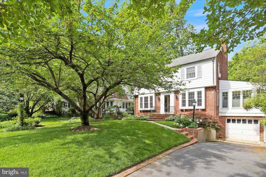 Traditional Arlington center hall colonial expanded on the side and rear for some unique features. Main level includes a large walk-in pantry, stainless steel appliances, ample counter space, prep sink, recessed lights, built-in speakers, and additional eat-in or family room space that walks out to the deck and fully fenced, flat yard with a playset (conveys!). The deck features a natural gas line for a grill. The main level also features a large living room with fireplace, formal dining room, powder room, coat closet, foyer, and large side addition with it's own HVAC system currently used a gym, but could be an office, family room, or play room. Upstairs you'll find a large master bedroom with a massive walk-in closet (currently used a nursery!), en-suite bath with tub, and bonus cedar closet. The hallway bath features a linen closet, stand up shower, and large vanity. One of the secondary bedrooms has custom built-ins, while the other is large. The main and upper levels feature oak hardwood flooring throughout. The basement features a 3rd full bath with shower, under stairs storage, large rec room with hardwood floors, recessed lights, and 2nd fireplace. The utility room includes storage, 2nd fridge, deep freezer, and washer/dryer. The HVAC is 2012, the water heater is 2012, the side addition HVAC is 2002. Ballston Quarter is just 1 mile, Lacey Woods Park, Woodlawn Park, and Westover are all within 1 mile also. Great location to enjoy all of Arlington's adventures! Located within the "Quiet Zone" so no hospital noise!