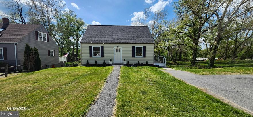 Charming move-in ready three level Cape Cod.  Great location to parks, swimming pool,  baseball stadium, restaurants and easy to I-66.  New Roof, New Deck, updated lighting and stainless steel appliances.  This spacious 3/4 bedroom 2 bath offers two main level bedrooms, a separate living and dinning rooms in addition a family room  The upper level offers two additional rooms and a full bath.  The unfinished basement offers room to grow with space for a rec room, laundry room or office.  Enjoy your spacious rear yard and covered patio with view of the creek and a workshop/storage closet.  All tvs/mounts stay with the property. This property does require flood insurance