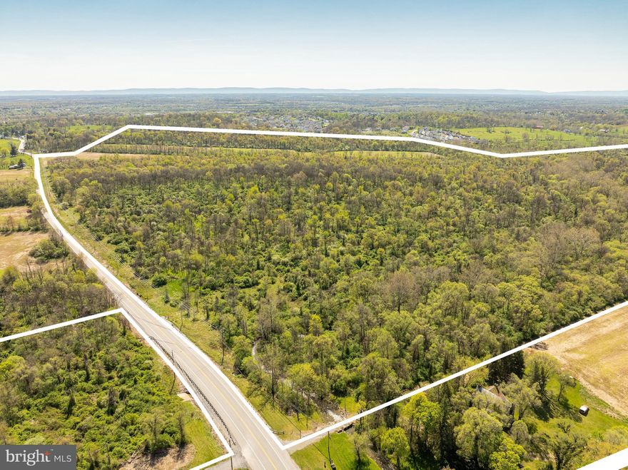 189± acres in a prime location 1 mile from Interstate 81 exchange in Inwood, West Virginia. Situated in Berkeley County, WV and just 5 miles from Frederick County, VA—two of the region’s fastest-growing areas. With no zoning restrictions, this property offers limitless potential. Recent infrastructure improvements include an I-81 traffic circle and newly elevated exit ramps, enhancing accessibility and traffic flow. The land is primarily flat, open fields with excellent visibility, making it an ideal site for a dynamic mixed-use/residential purpose.  6" main waterline runs along Gerrardstown Rd.   An additional 57+/- acres that adjoins on the north side of Gerrardstown Rd  is also available for $3,000,000.