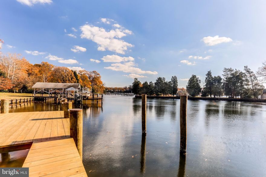 Gorgeous, Fully-Renovated Cape Cod located on quiet, protected cove off the Severn River. High-end finishes at every turn, gleaming hardwoods and main level living overlooking amazing water views. Entertain at this private oasis on the large patio or deck-side at pool. Large, usable waterfront yard is perfect for pet owners and families alike. Living here will make you feel like you're on vacation