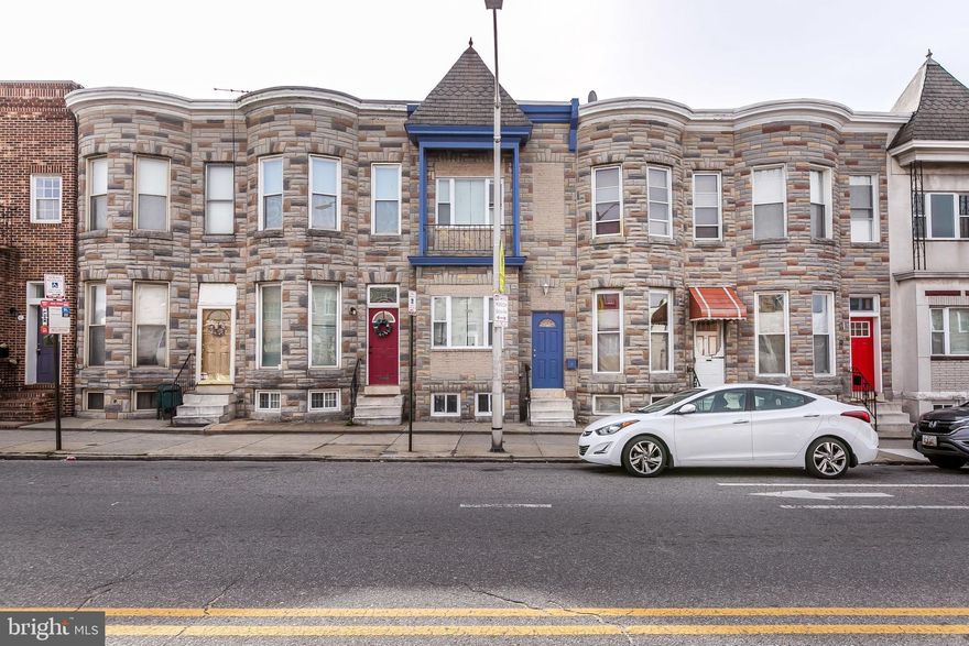 Large Newly Renovated Townhome near Patterson Park & Highlandtown with a Detached Garage, Fully Finished Basement, and Spacious 2nd Floor Deck with City Views.  Enter this beautiful home to a formal sitting room, next is a spacious dining room that leads to your dream kitchen.  4th Bedroom or Office is beyond the kitchen.  The rear yard is enclosed and leads to a detached garage that could be converted to a parking garage.  The second level offers 3 Bedrooms and 2 Bathrooms.  At the rear is a very spacious deck with great city views.  Fully finished basement offers extra room to spread out and entertain along with a half bath.  At the rear of the basement is an additional room for storage.  This home has it all so don't miss this opportunity!