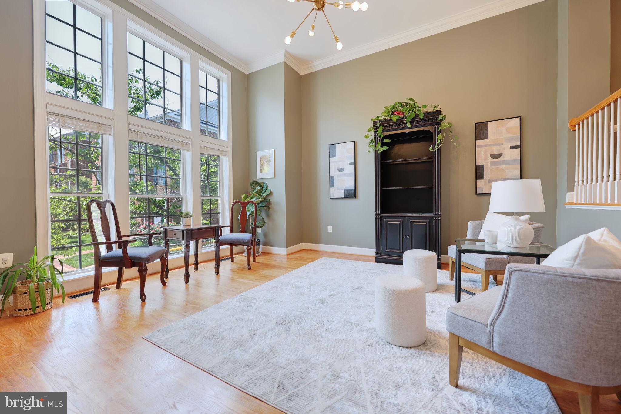 Welcome to 704 Vestal Street , an amazing opportunity to own a rarely available townhome on one of Belmont Bay’s most desirable and well-loved streets.
This beautifully updated home is filled with light, space, and style.
Starting with a grand foyer featuring soaring 10-foot ceilings that opens into an expansive living area with dramatic floor-to-ceiling windows. Newer carpet (2023), updated light fixtures, and a fresh, modern color palette give the home a clean and inviting feel from top to bottom.
The kitchen is the true centerpiece, featuring a large center island with gleaming white quartz countertops, custom wood cabinetry, and plenty of room to cook, gather, and entertain. Just off the kitchen, the newer composite deck offers the perfect spot to sip your morning coffee while enjoying the peace and quiet of the neighborhood.
Upstairs, the spacious primary suite includes two walk-in closets, tray ceiling detail, a private balcony, and a spa-like en suite bathroom with a soaking tub and double vanity. Two additional bedrooms are generously sized, and the bathrooms throughout the home have been thoughtfully updated with a clean, modern style.
The finished basement adds even more flexibility, with a rough-in for an additional bathroom, a dedicated laundry room, and plenty of space for a home office, gym, playroom, or guest suite. An oversized two-car garage offers ample room for storage, hobbies, or whatever suits your lifestyle. And with two newer AC units, the home is move-in ready and built for comfort.
Located in Belmont Bay, a vibrant waterfront community along the Occoquan River, this home is just steps from scenic walking and biking trails, a full-service marina, tennis and basketball courts, a community pool, and regular neighborhood events like summer concerts . With the VRE station, shops and dinning just minutes away and nature escapes like the Occoquan Bay Wildlife Refuge nearby, you get the perfect mix of convenience and tranquility.
Homes on Vestal Street don’t come up often, making this a rare and exciting chance to own in one of the community’s most charming spots. With updates throughout and priced to sell, 704 Vestal Street is ready to welcome you home.