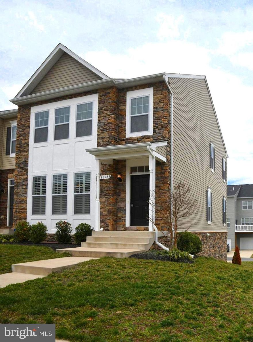 This large beautiful 3 year young home is truly better than new!  The owner has made many enhancements including a customized rear deck. "on demand" hot water, upgraded lighting, finished lower level with full bath,  granite counters,  premium carpeting, and more!  Features a wide open floor plan with a wonderful gourmet kitchen situated between  the large living room and huge family room.   The family room has a sliding door to  the almost new rear deck.   The master bedroom is surprisingly large.  This home is located in  Leonardtown  and close to shopping, schools, recreation, boating, golf and hospital.  The community offers Club house, basketball courts, tennis courts, swimming pool. walking and jogging trails and so much more. Your buyers should truly see this home! Its easy to show!