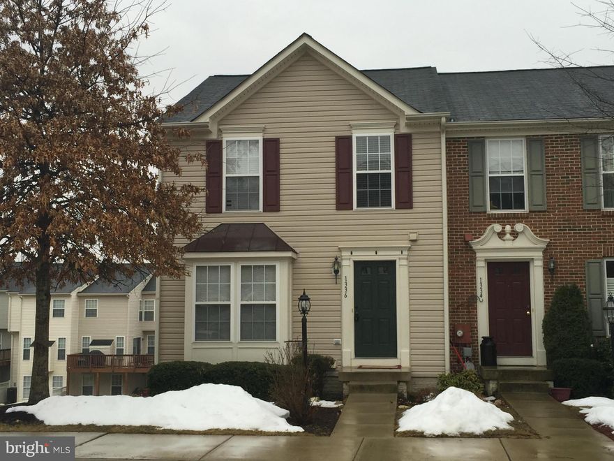 Beautiful End Unit townhouse in a wonderful Neighborhood with the perfect location!   Hardwood floors throughout the main level, open floor plan, bumpout, finished basement, mountain view from the deck, fenced yard, and more. Shows Great!!