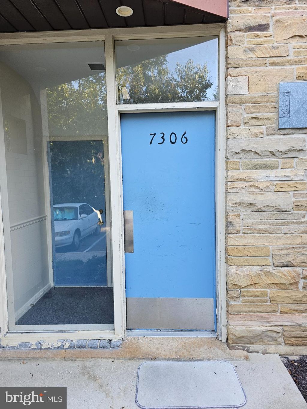 Photo of 7306 Park Heights Avenue #A, BALTIMORE, MD 21208 (MLS # MDBA2186870)