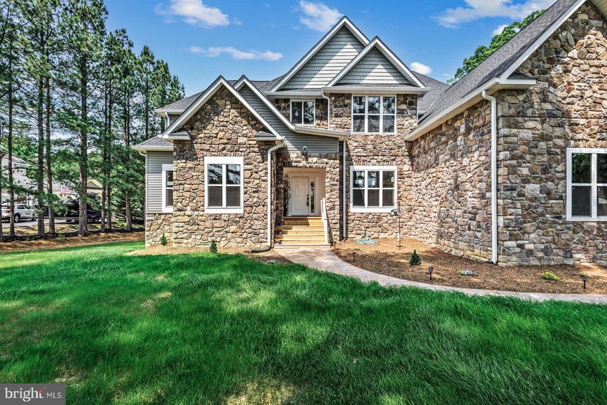 New construction centrally located to everything,  just minutes  to I-95 If you need space this one is for you!  8 bedrooms , 8 full and 1 half bath.  8500 sq foot plus it has a  960sq ft detached home.  Family room has 12' ceilings Home has natural light and beautiful windows throughout. Combination of carpet , laminate and tile floors. Huge walk out basement with 10.5' ceilings. The 3 car oversized garages could easily accomodate a car lift.  
This home has  an additional detached 960sq ft home that conveys as is.
.There is no HOA, city sewer and private well.  this is a unique property and a must see. Motivated seller!
Additional building conveys as is!