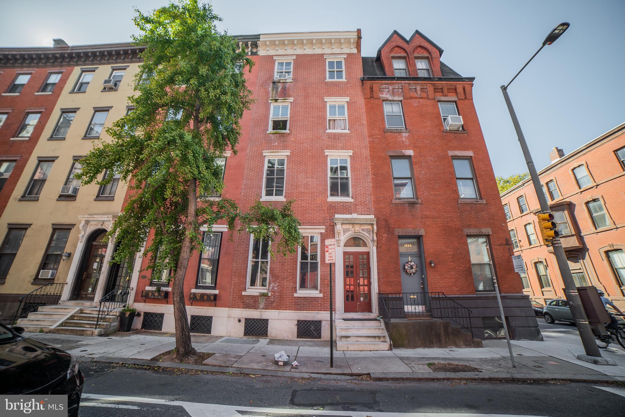 Grand building with original features in unbeatable location, a block from Rittenhouse Square. 7 residential units; 6 One Bedroom units and 1 Studio unit. Restored brick front with new windows. Wood floors, 3 ornamental fireplaces, and high ceilings throughout. Separate hot water heat for each unit. One hot water heater for all the units replaced 09/ 2019. Shared washer/dryer in the Basement. Owner pays electric. Large lot 18 x 103 , 4400 square feet. Property needs updating.