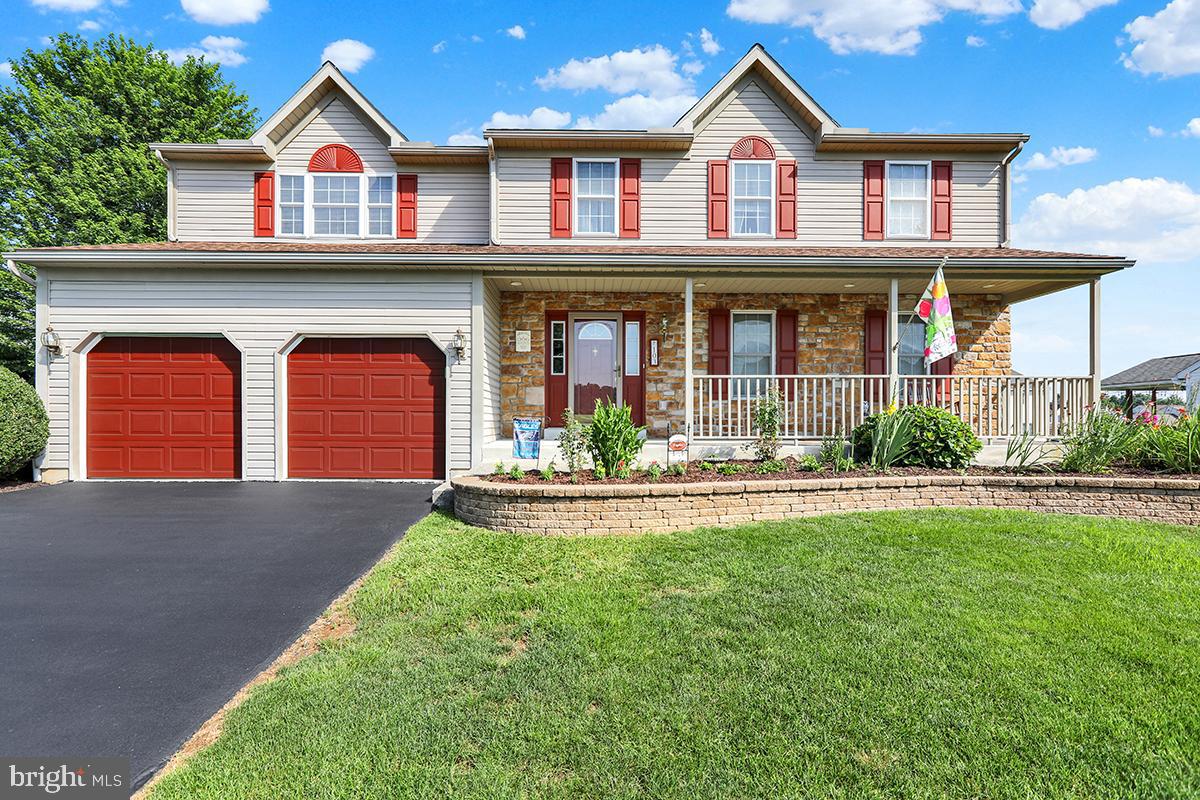 Terrific Curb Appeal for this 2 Story home in Heidelberg Run E, and the Conrad Weiser School District. There is a 28 pull wood cabinetry kitchen with a center island, tiled backsplash and pantry closet that adjoins the breakfast area. All appliances are less than 5 years old. A sliding patio door exits to the covered paver patio where you can relax and enjoy the lovely back yard. There is a brick walkway along the side of the house, as well. The patio is built on a 5' deep footer and would be perfect for an added enclosure. The cozy family room has a gas fireplace to warm those cool winter days. A formal living room and dining room adds space to use as your family desires. The laundry room is on the main level. 4 spacious bedrooms and 2.5 bathrooms make up the upstairs. The master bathroom features a jacuzzi tub and a tiled walk-in shower. The guest bathroom has a tub/shower. A full front porch can be enjoyed seasonally and the paver walls around the flower beds add a caring detail to the home. A new roof was put on in 2020, the heating system replaced in 2020, A/C replaced in 2025, hot water heater replaced in 2018. The driveway was recently seal coated. This great location is close to schools, shopping, and major roadways. A fast closing can accommodate any needs for the start of the new school year.