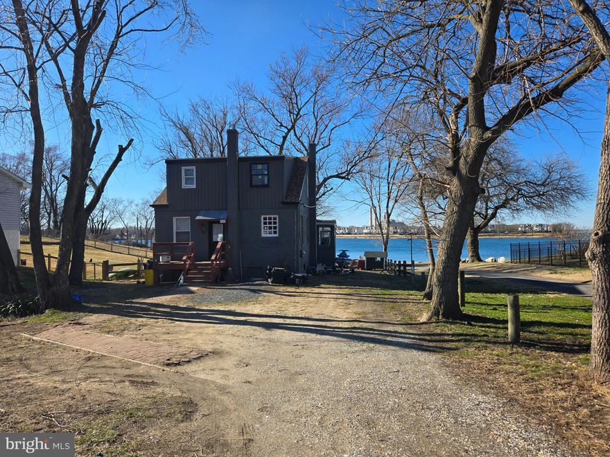 WOW—what a view! Take in breathtaking, unobstructed water views that create a serene and ever-changing backdrop to your everyday life. This home was in the midst of a thoughtful renovation, offering a rare opportunity to step in and complete a vision—or design your own custom retreat from the ground up.

Picture a stunning deck just off the sliders, the perfect setting for morning coffee, evening sunsets, and effortless indoor-outdoor living. With the community beach just steps beyond your back gate, the water becomes an extension of your lifestyle.

Enjoy the benefits of non-riparian waterfront living—capturing the beauty, tranquility, and charm of the water without the premium price attached. A unique opportunity to create something truly special.

Conventional financing required due to current renovation status.

Water oriented community of Riviera Beach offers a sandy beach, walking paths, community parks, baseball fields, and so much more - and  for a small fee,  boat ramp access  - the voluntary community association helps maintain all Riviera Beach has to offer.