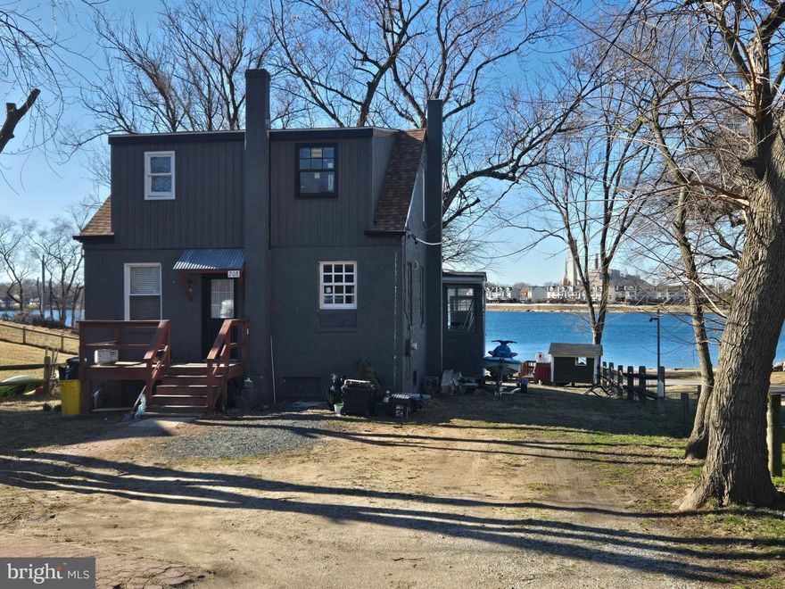 WOW—what a view! Take in breathtaking, unobstructed water views that create a serene and ever-changing backdrop to your everyday life. This home was in the midst of a thoughtful renovation, offering a rare opportunity to step in and complete a vision—or design your own custom retreat from the ground up.

Picture a stunning deck just off the sliders, the perfect setting for morning coffee, evening sunsets, and effortless indoor-outdoor living. With the community beach just steps beyond your back gate, the water becomes an extension of your lifestyle.

Enjoy the benefits of non-riparian waterfront living—capturing the beauty, tranquility, and charm of the water without the premium price attached. A unique opportunity to create something truly special.

Conventional financing required due to current renovation status.

Water oriented community of Riviera Beach offers a sandy beach, walking paths, community parks, baseball fields, and so much more - and  for a small fee,  boat ramp access  - the voluntary community association helps maintain all Riviera Beach has to offer.