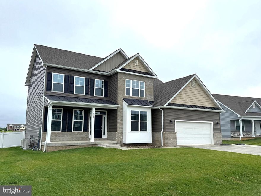 Immediate Delivery.  Spacious Colonial in desired location close to Spring Mills offering over 3500 sqft of living space with 5 bedrooms and 3.5 baths. Entry 2-story foyer w/ curved stairs and 9ft ceilings on main level.  Features include spacious Family Room, upgraded kitchen w/ island bar, pantry, and granite countertops, additional separate dining and living rooms and private den/ study with bay windows on main floor. The 20 ft Primary bedroom has tray ceilings, 2-walk-in closets, and full bath w/ soaking tub and tiled shower w/ glass door. The fully finished basement has large 27ft rec room, 5th bedroom, full bath, separate flex room and storage room. Home comes with brick front, full front porch, large 12x16 composite rear deck, fully fenced rear yard and 2-car garage with auto openers.  2x6 energy efficient construction.   Builder pays $15,000 towards close assist.