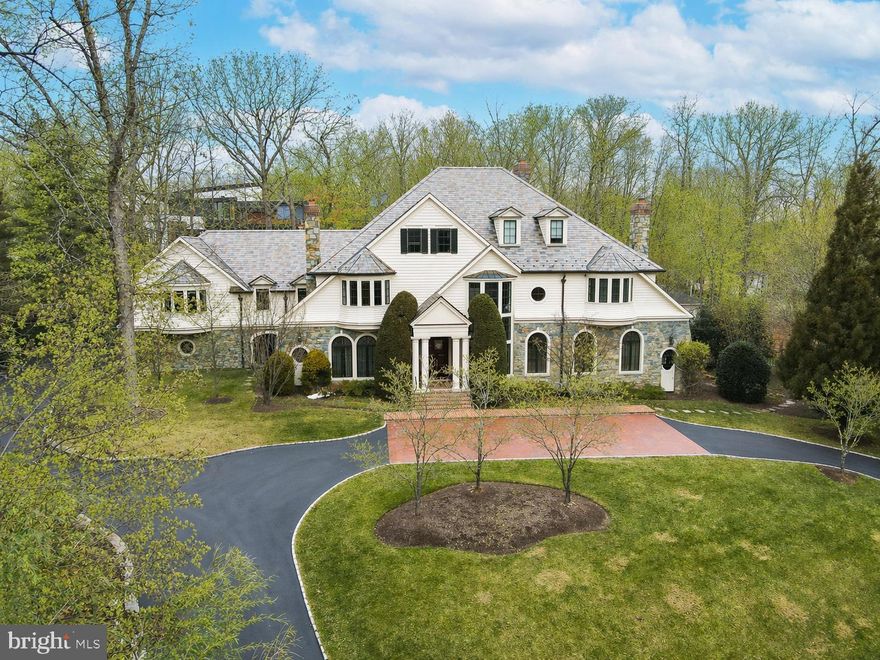 Come home to the definition of luxury in the heart of Potomac.  Built by acclaimed Gibson Builders, this breathtaking, one-of-a-kind property is filled with custom features, exquisite design and a warmth so rarely found in homes of its size. This home exudes high-end practical living with expert craftsmanship, a tasteful interior and thoughtful layout. The two-story grand foyer evokes Old Hollywood glamour with its curved staircase and gleaming crystal chandelier. To the right of the foyer is a formal living room with stone fireplace and hand painted ceiling by local artist Maggie O’Neill. The entire house has a gracious flow, leading from the living room to a stately clubroom, complete with a full wet bar and billiards space. This property is well suited for both large-scale entertaining or more intimate living. The centrally located great room serves as the heart of the home and is the perfect intersection of form, function and technology. Custom built-ins, a coffered ceiling and beautiful hardwood floors bring a warmth to such a grand space. The state-of-the-art drop-down movie screen makes this an ideal gathering spot for entertaining friends or cozy movie nights. Adjacent to the great room is a top-of-the-line chef’s kitchen with wooden ceiling beams, paneled appliances and an oversized walk-in pantry. There is an adjacent wet bar and sun-drenched breakfast room with direct outdoor access. The expansive formal dining room is the optimal space to host holidays and all of your special events. Take the elevator to the upper level which boasts six well-appointed bedrooms. The unparalleled owner’s suite has a sitting area, custom walk-in closet, luxurious bathroom for two with soaking tub and balcony access. The second jaw-dropping owner’s closet feels more like a boutique--it’s a fashion lover’s dream come true! There are five additional bedrooms on the upper level, all with  en-suite bathrooms and walk-in closets. One of the bedrooms serves as a spacious second owner’s suite with sitting area. An upper level bonus room with built-ins and a gas fireplace is the perfect flex space that can be used as an office, homework area, playroom, or meditation space. The lower level has a temperature-controlled wine cellar, full gym, massage area, sauna and spa shower/changing room. There is also an en-suite bedroom, additional wine room, a recreation area with bar and ample storage space. This property offers your own private Oasis with a beautiful pool and spa and handsomely landscaped grounds. Divine outdoor recreation extends from the covered stone patio to the built-in BBQ area to the custom pool house complete with kitchenette. Other amenities include a four-car garage, newly-renovated laundry room with steam machine and security system. This home is truly a masterpiece that will be cherished for generations to come. Minutes to Potomac Village with easy access to the DC Metro area.