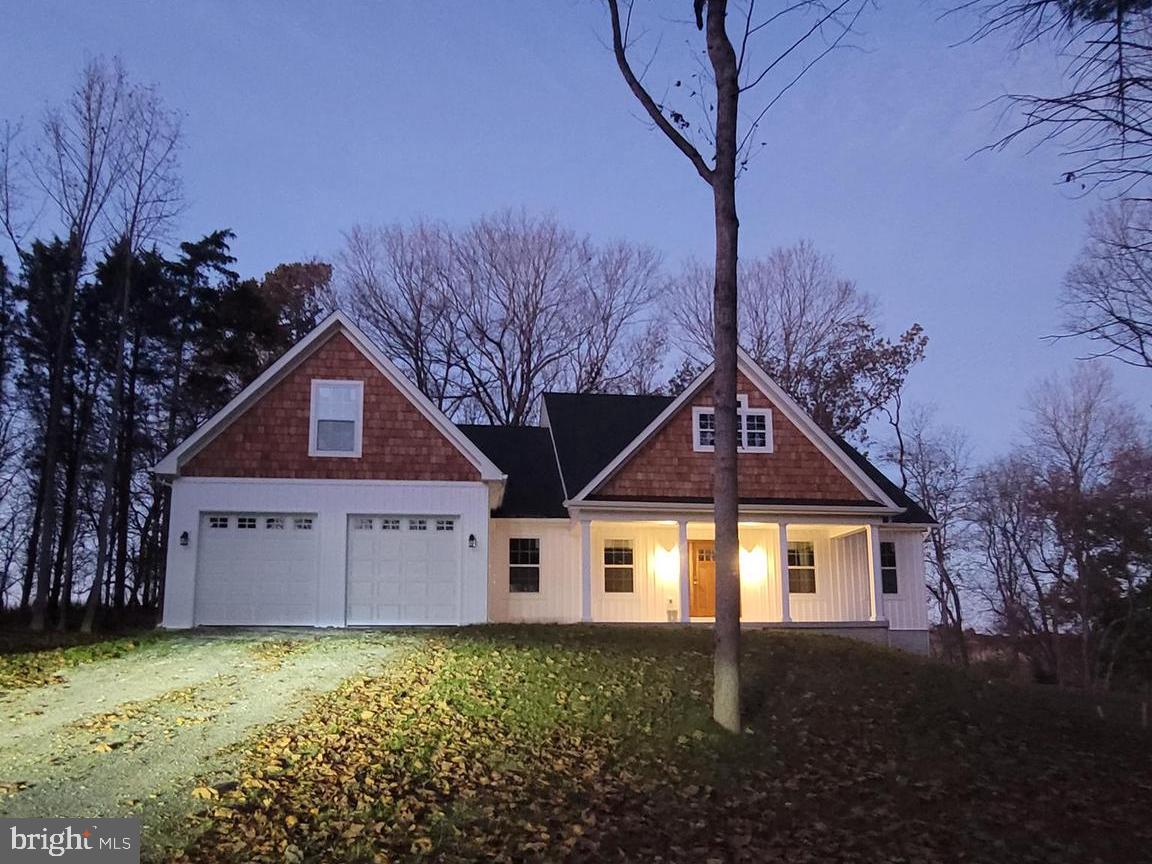 10 +/-wooded acres of tranquility. Amazing location for this 4 bed 3.5 bath ranch style home. Quality construction nicely upgraded with stainless steel kitchen appliance package, granite, luxury vinyl plank flooring, upgraded cabinets, vaulted ceilings & more. Full unfinished basement. Close to amenities in a private country setting. Builder has tastefully selected all the finishes for you. Pictures are of similar finishes with various upgrades and layout. Completion expected for February/March2024. Just minutes to all that Shepherdstown has to offer. Mature trees compliment the privacy and tranquil attributes this property has to offer and close to the Potomac River.