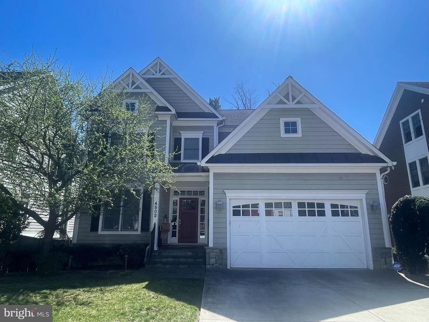 Welcome to 4502 Maple Avenue – a beautifully appointed 7-bedroom, 4.5-bath residence located on a picturesque, tree-lined street in highly desirable East Bethesda. Just moments from downtown Bethesda, Metro, parks, and top-rated schools, this spacious home blends timeless charm with thoughtful modern updates—offering the perfect balance of comfort, function, and style.

Step inside the welcoming foyer and discover a light-filled formal living room ideal for cozy evenings or entertaining with ease. The adjacent formal dining room sets the stage for memorable gatherings, while the updated kitchen offers sleek countertops, generous cabinetry, and easy access to the rear patio for seamless indoor-outdoor living.

A bright and airy family room with fireplace and built-ins, just off the kitchen, provides the perfect retreat for relaxing. An office, powder room and access to the garage on the main level adds everyday convenience.

Upstairs, discover four generous bedrooms, including a tranquil primary suite with a private en suite bath and ample closet space. Three additional bedrooms share this level with access to two full bathrooms. Also on this level is a sunny and convenient laundry room.

The finished second upper level is home to two additional bedrooms, full bathroom and additional living space. 

The fully finished lower level adds even more living space with a large recreation room with fireplace, a large bedroom with a full bath, and plenty of storage.

Outside, enjoy a beautifully landscaped and private backyard, ideal for entertaining, gardening, or simply relaxing in the fresh air. This meticulously maintained home is a true gem in one of Bethesda’s most sought-after neighborhoods—offering suburban serenity with unbeatable urban convenience.