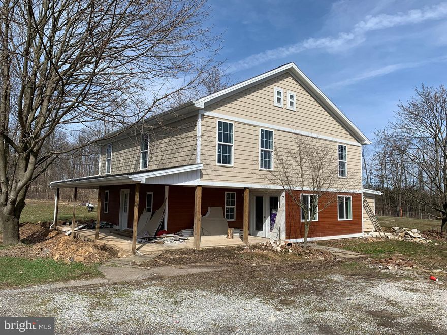 Roughed-in shell ideal for an investor to use to flip or as an investment property. Property is being sold as-is. Includes brand new siding, windows, & roofing materials. Hvac, drywall, electric, & septic are completed. Water line can be put in. There are some new rough-ins that have been completed and/or will be included. The seller would be happy to provide contact info for the contractors that have been involved who may have discounted rates available. This home sits on 2.65 level acres backed by State Game Land and is convenient to Routes 15 & 94.