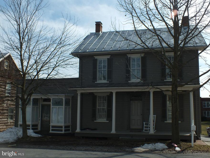 Beautifully updated historic home in Uniontown - totally new kitchen, baths and laundry as well as fresh paint and refinished hardwood floors throughout the home. Enjoy sitting and relaxing on either the front or the back covered porches.