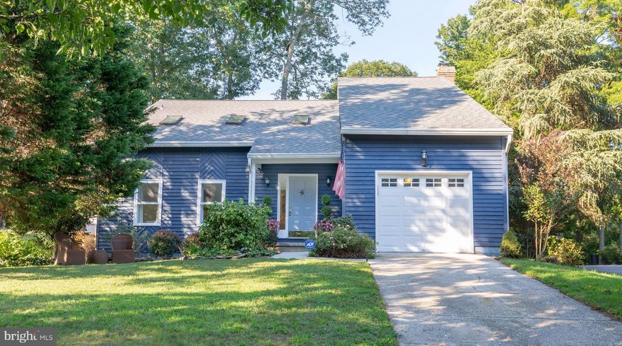 Stunning kitchen renovation with honed marble and white cabinets.  You will fall in love with this hip contemporary home featuring wood floors, vaulted ceilings, skylights, finished lower level, fireplace, and fenced back yard.  The cool pond neighborhood is tucked away off of Robinson road and is walkable to the high school and B&A trail. This is a fabulous location in the heart of Severna Park.