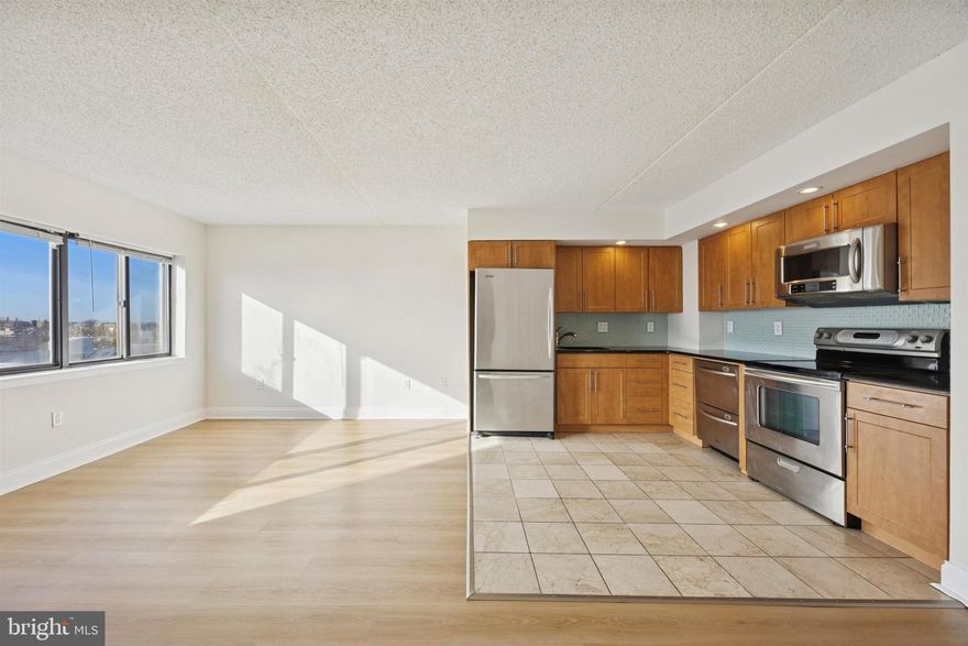 Welcome to 200-10 Lombard St, Unit #820, a bright and comfortable 1 bed, 1 bath home in the heart of Society Hill. This unit offers an airy open layout with beautiful natural light, clean modern flooring, and a smartly designed kitchen featuring warm wood cabinetry, stainless steel appliances, and a tiled kitchen zone that keeps the cooking space practical and easy to maintain. The living area is spacious enough for both lounging and dining, with large windows that bring in great skyline views. The bedroom is generously sized with great light and closet space, and the full bath includes a tiled tub and shower plus a vanity for extra storage. A major bonus is the in unit laundry setup, and you also get a private outdoor balcony where you can enjoy open city views and fresh air right at home.