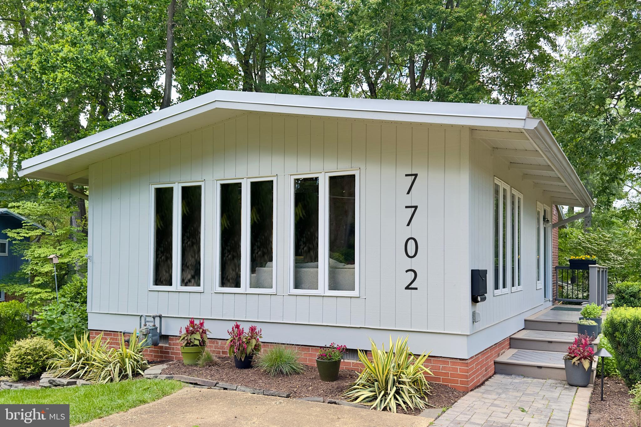 7702 POPLAR TREE LANE