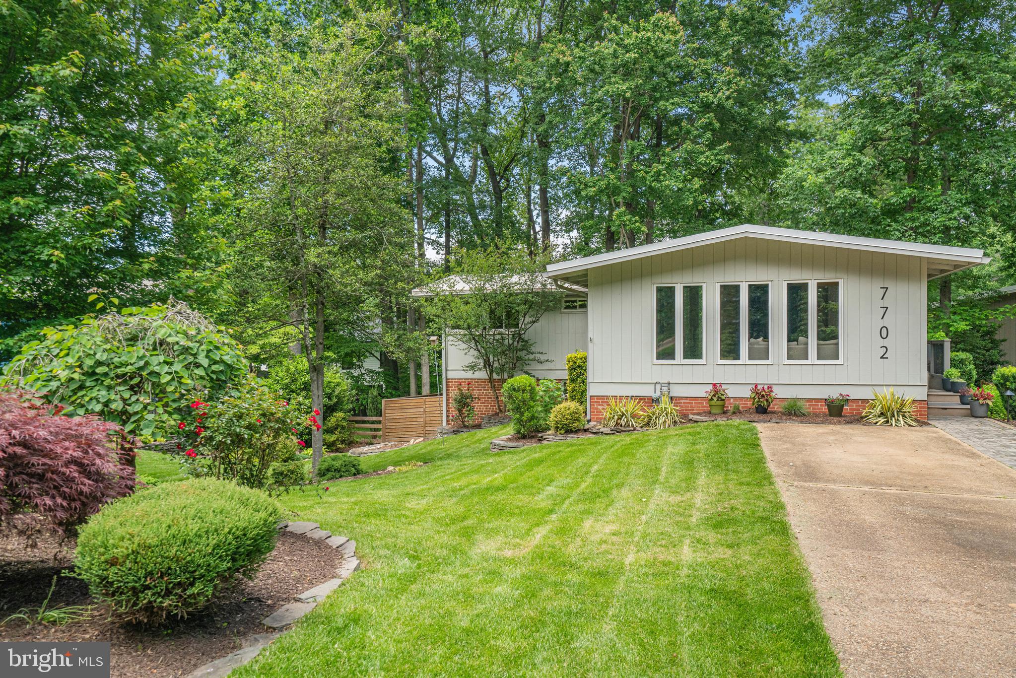 7702 POPLAR TREE LANE